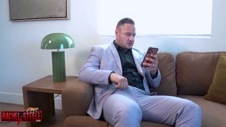 Suit-wearing man on couch xxx movie